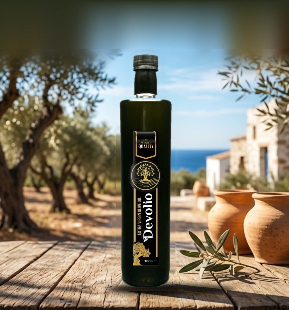 A 1000 ml bottle of Devolio extra virgin olive oil on a wooden table in an olive grove